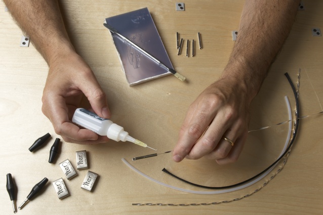 Produktion der Yter Kabel von Hand